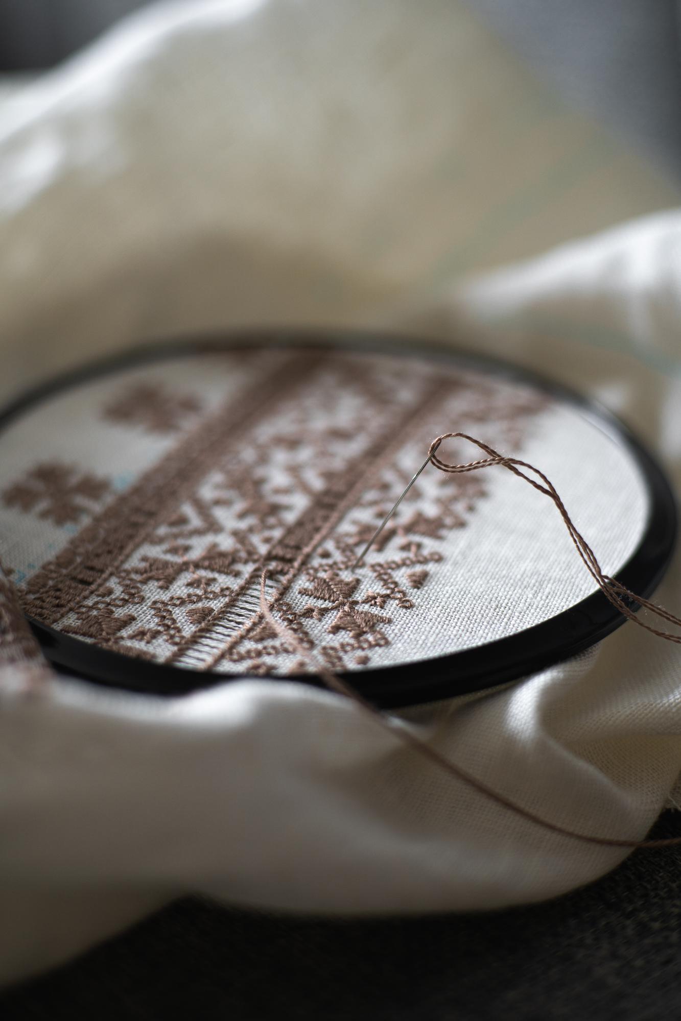 Close-up luxury embroidery on silk fabric